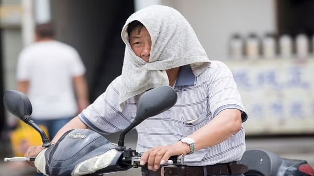 China issues yellow alert for high temperatures