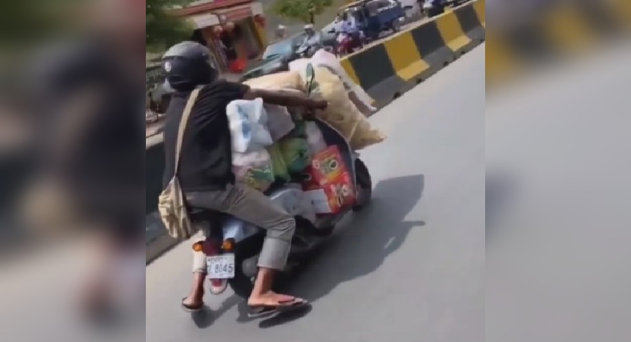 Watch: Man struggles to ride overloaded scooter, T’gana cops reacts