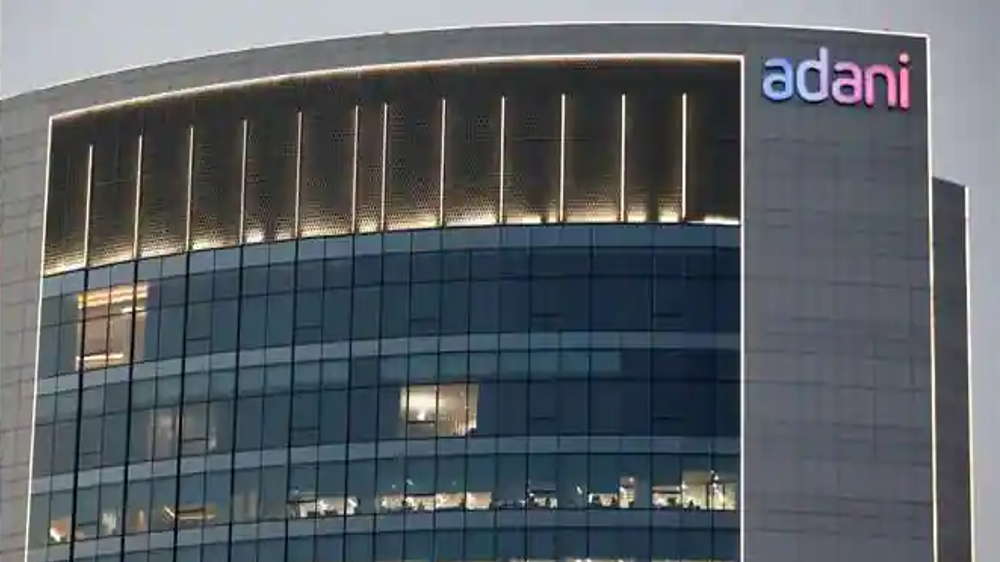 Adani Group firms pledge more shares for SBI