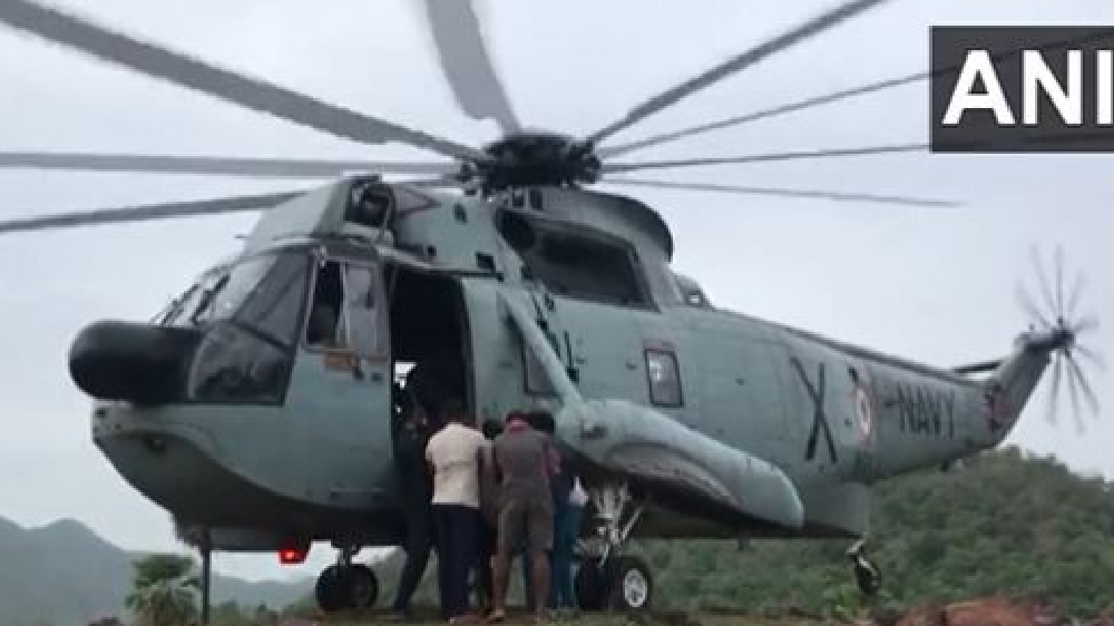 Indian Navy choppers continue relief operations in Andhras Eluru Indian Navy choppers continue relief operations in Andhras Eluru