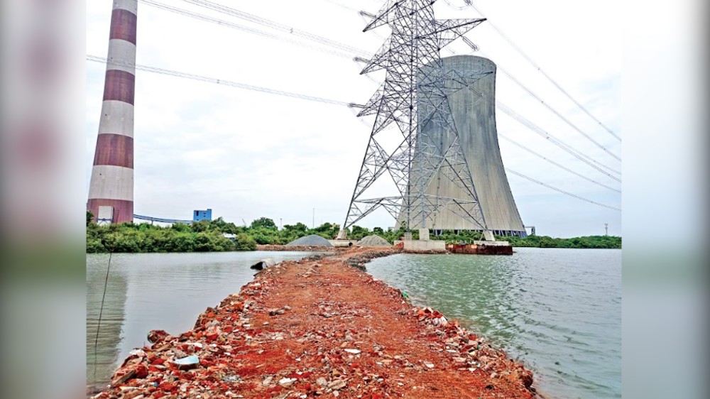 Tantransco violating norms by laying road inside Kosasthalai river
