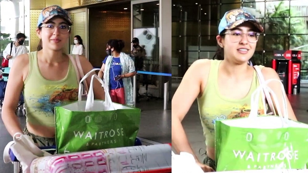 Sara dons green cut sleeve top & matching track pants at airport