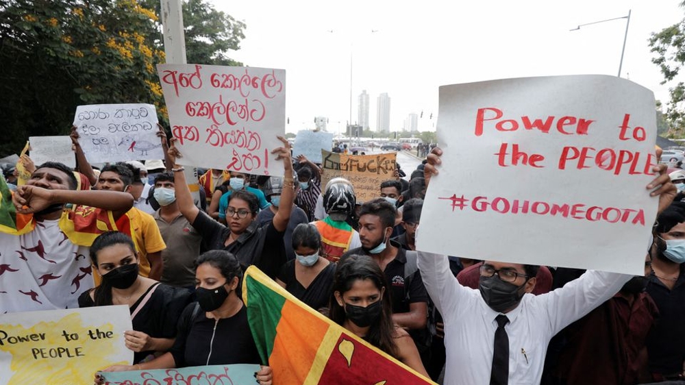 Sri Lankas Rajapaksa quits; We are the real power says protester