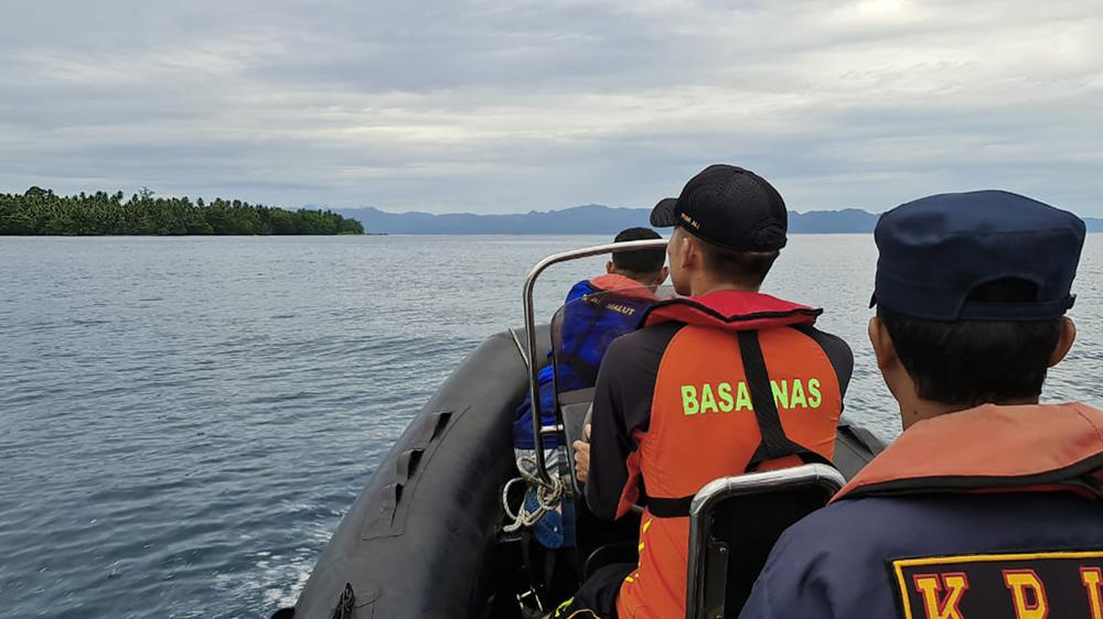 Rescuers search for 13 after boat sinks in Indonesian waters