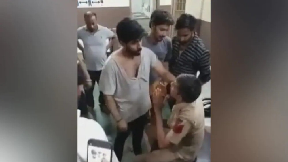 Viral video shows constable beaten by mob inside police station Viral video shows constable beaten by mob inside police station