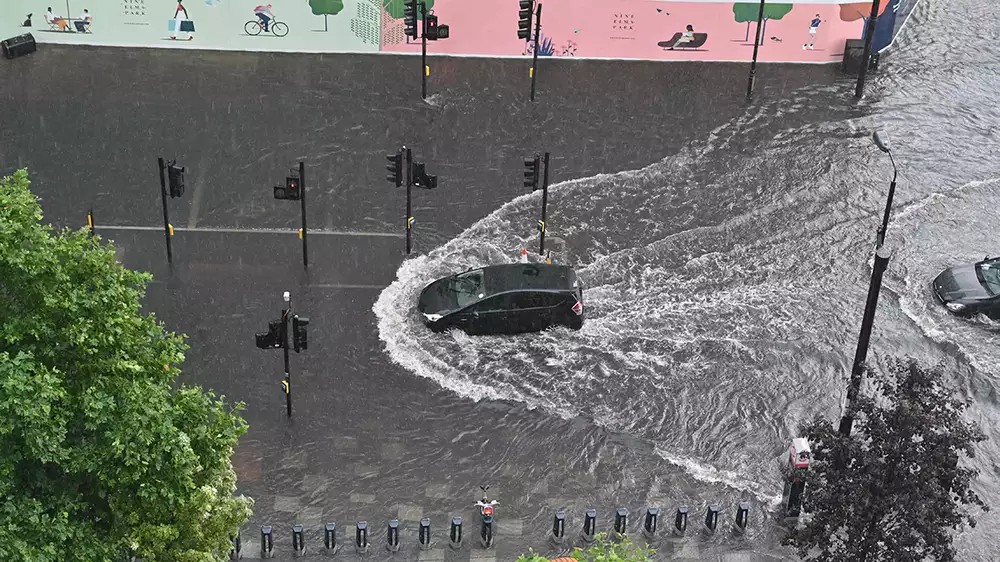 Roads flooded as heavy rain, thunderstorms hit parts of UK Roads flooded as heavy rain, thunderstorms hit parts of UK