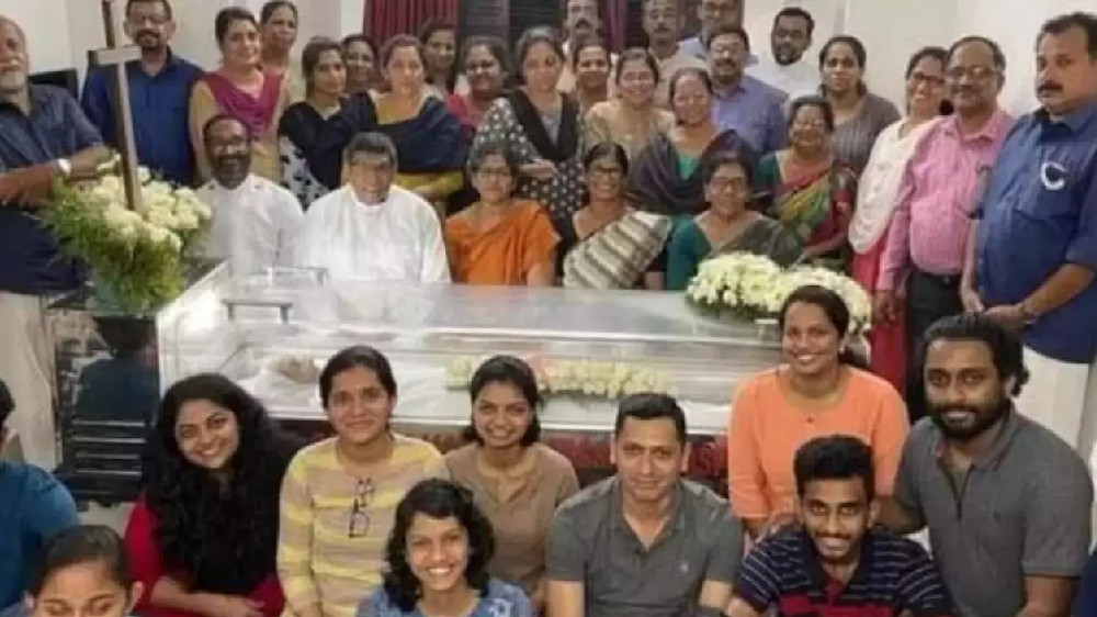 Kerala family poses for happy pic with dead mother