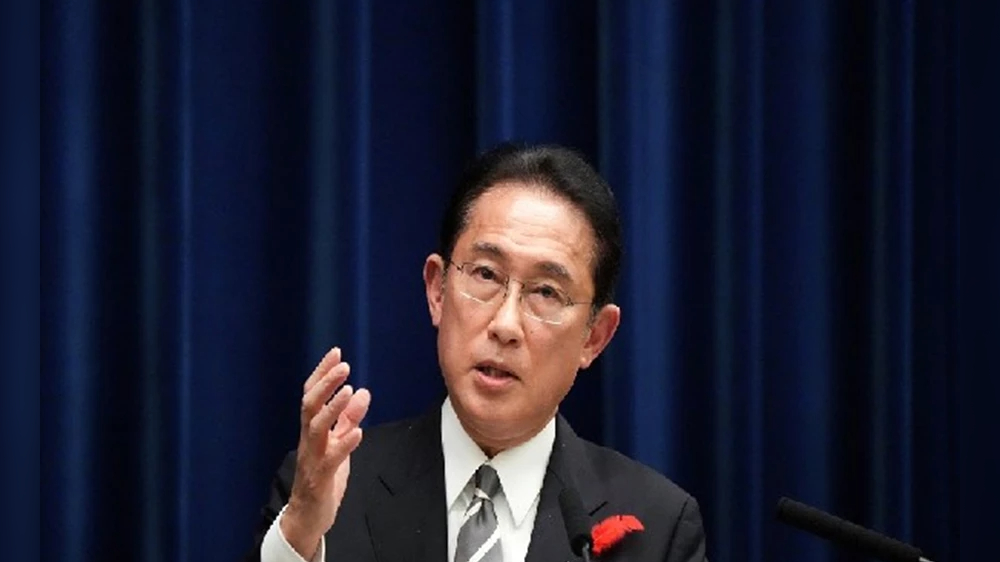 Japan PM names new Cabinet, shifting some over church ties