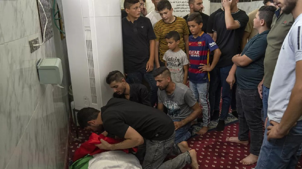 Palestinians: At least 4 killed in Israeli raid in West Bank Palestinians: At least 4 killed in Israeli raid in West Bank