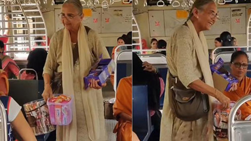 Elderly woman sells chocolates on train, video goes viral Elderly woman sells chocolates on train, video goes viral