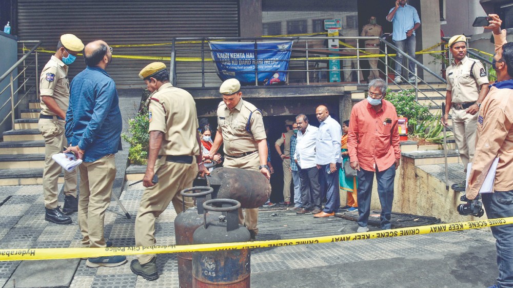 Fire from EV shop kills 8, probe on