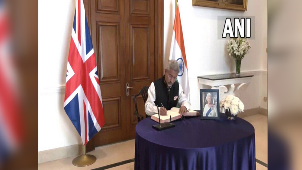 Jaishankar signs the condolence book for Queen Elizabeth II