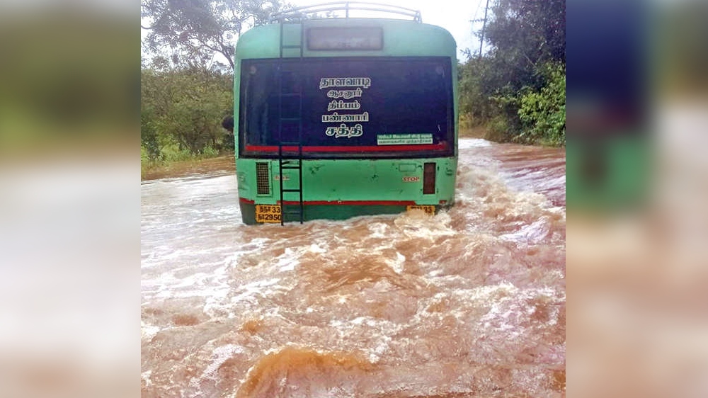 Passengers get scare of life as bus gets stuck in flooded causeway