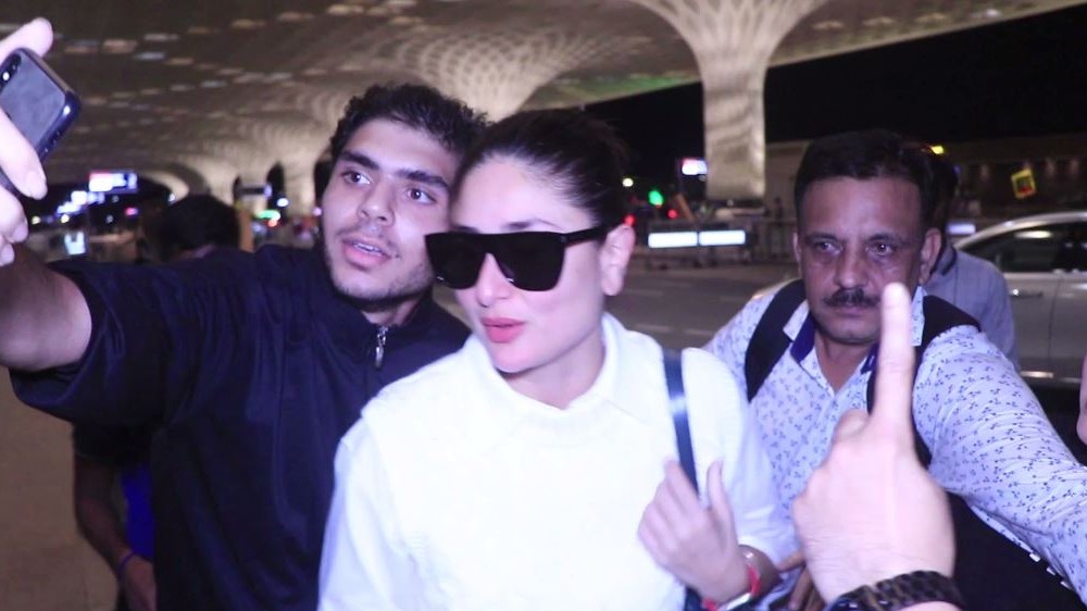 Kareena gets mobbed by fans at airport, handles it calmly