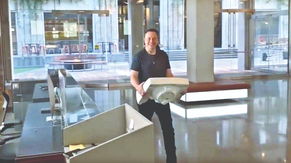 Elon Musk posts video of himself strolling into Twitter HQ