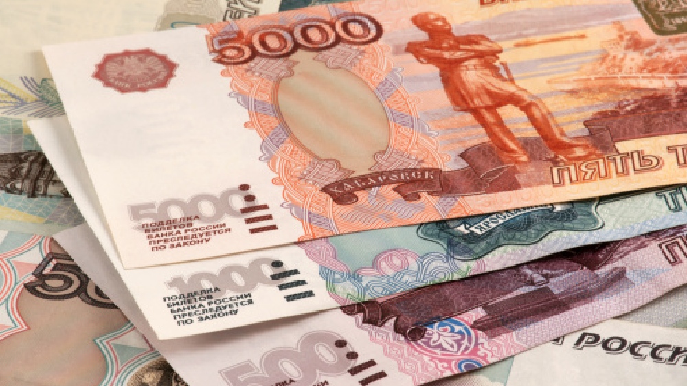Rouble slides to near three-week low vs dollar in early trade