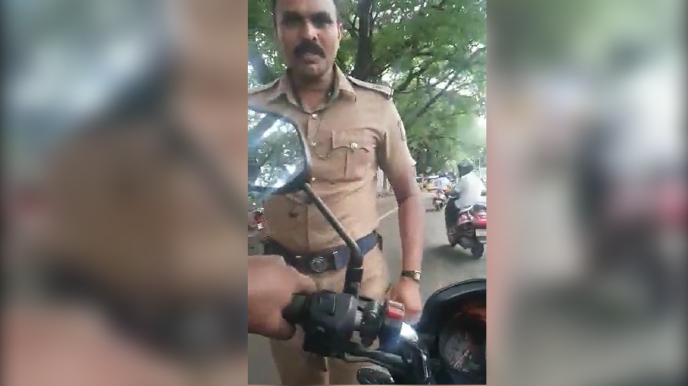 Helmetless ride: Policeman in viral video issued traffic challan