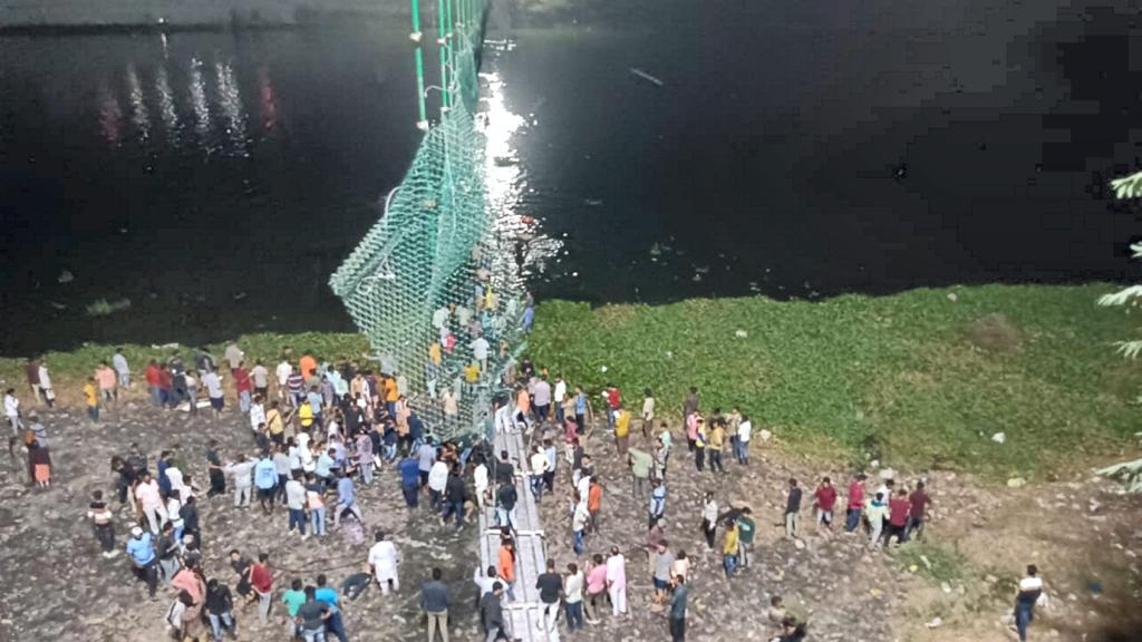 Morbi bridge collapse toll mounts to 130; more bodies fished out Morbi bridge collapse toll mounts to 130; more bodies fished out