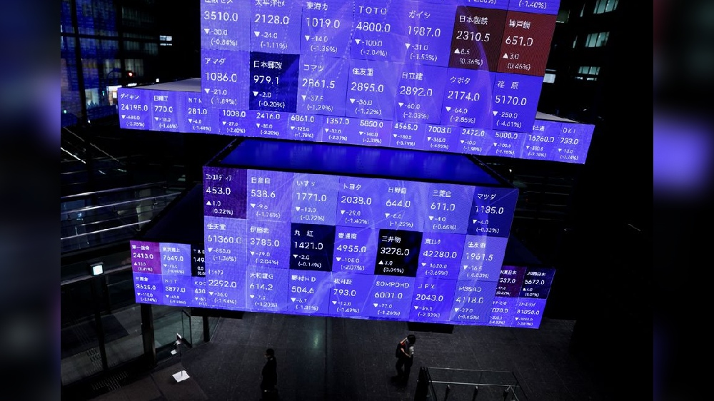 Stocks slip in Asia, brace for CPI and earnings