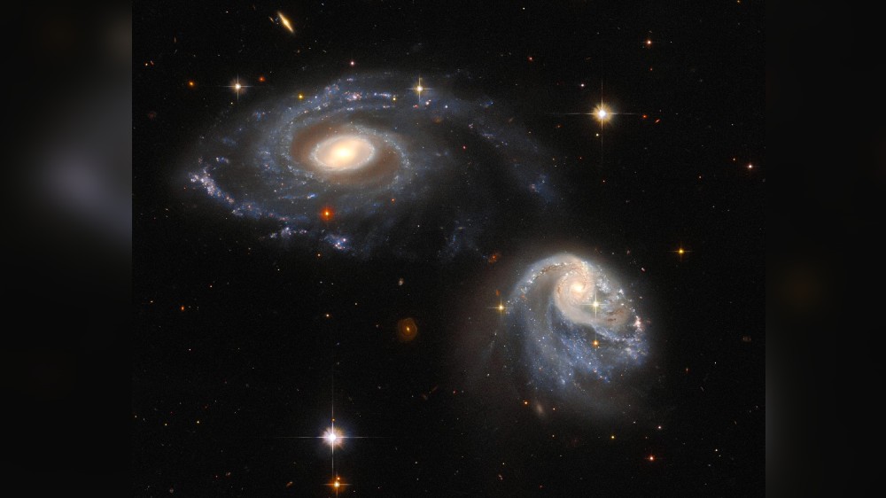 NASAs Hubble captures spectacular pair of interacting galaxies