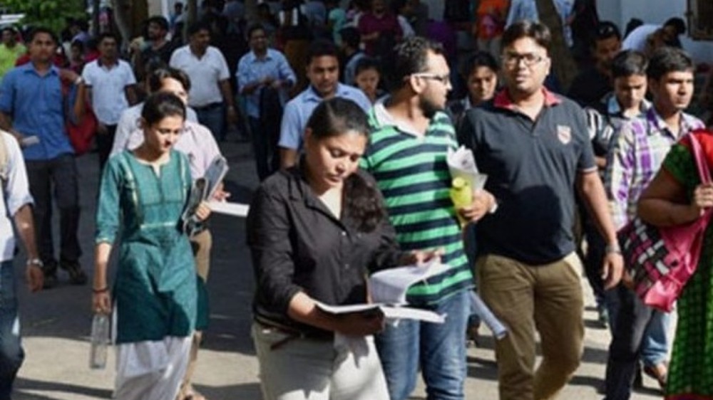 Old principal still in college, successor takes charge