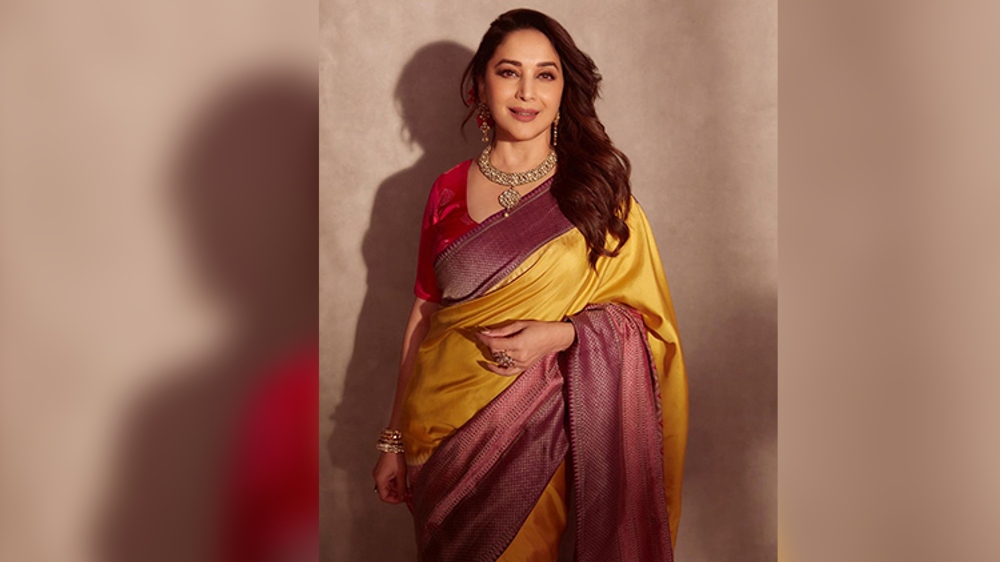 Madhuri Dixit looks gorgeous in yellow saree