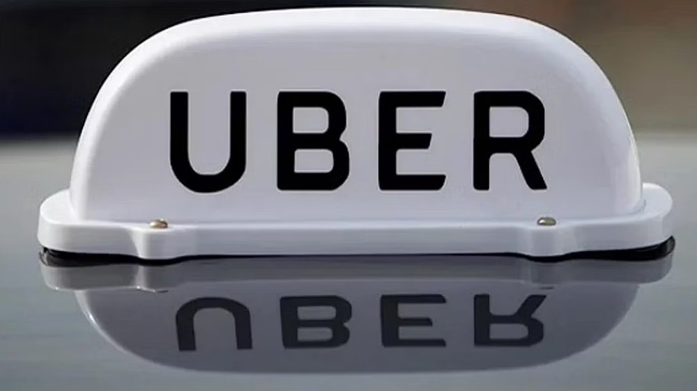 Uber back in robotaxi game, inks 10-year deal with Motional