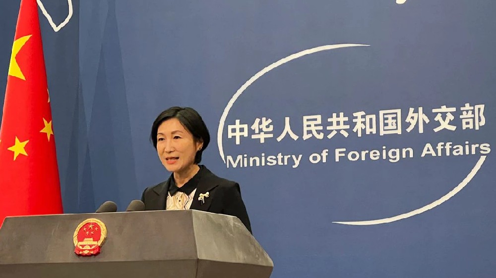 Resolve Kashmir issue through dialogue: China