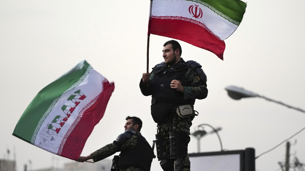 At World Cup, US soccer scrubs Islamic emblem from Iran flag