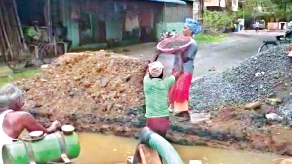 Culvert filled with concrete without draining, contractor suspended