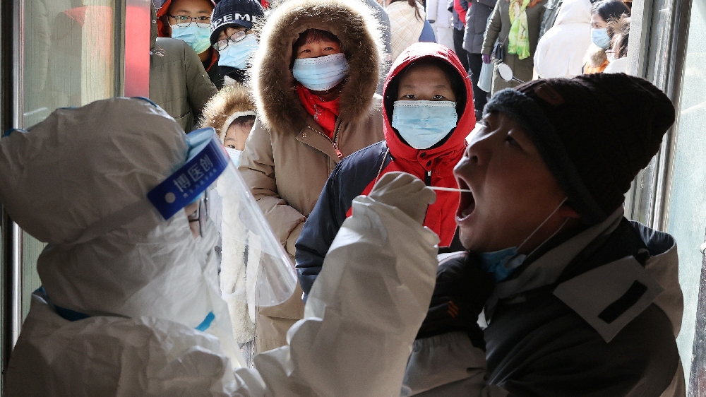 China reports third consecutive daily record for new COVID cases