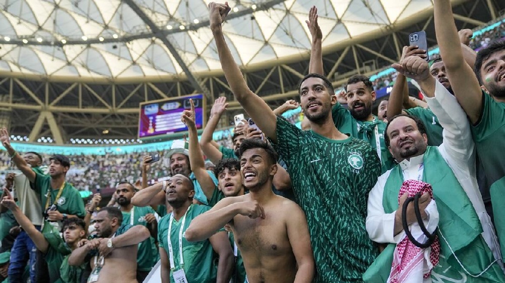 Soccer - Arab fans unite after surprise wins in Qatar