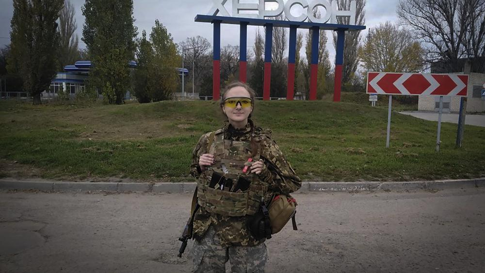 Ukrainian police, broadcasts return to long-occupied city