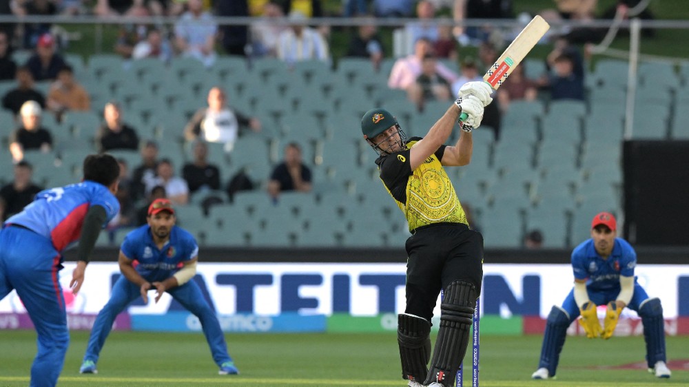 Australia survive Rashid scare to keep slim semifinal hopes alive