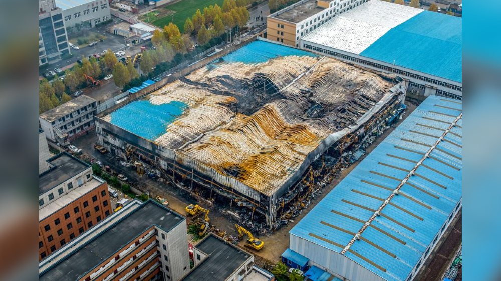 4 detained over China trading company fire that killed 38