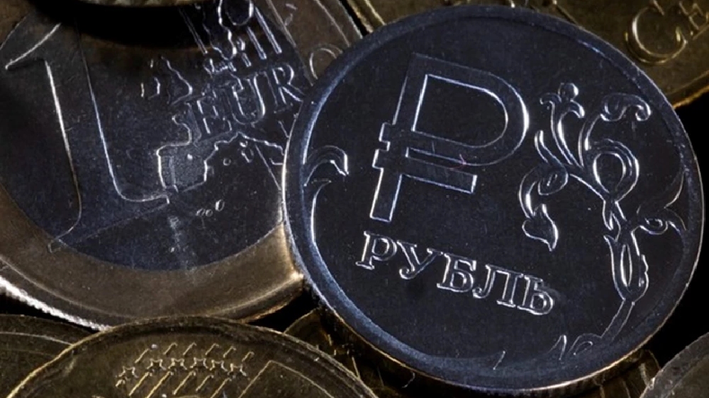 Russian rouble edges up in narrow trading range vs dollar
