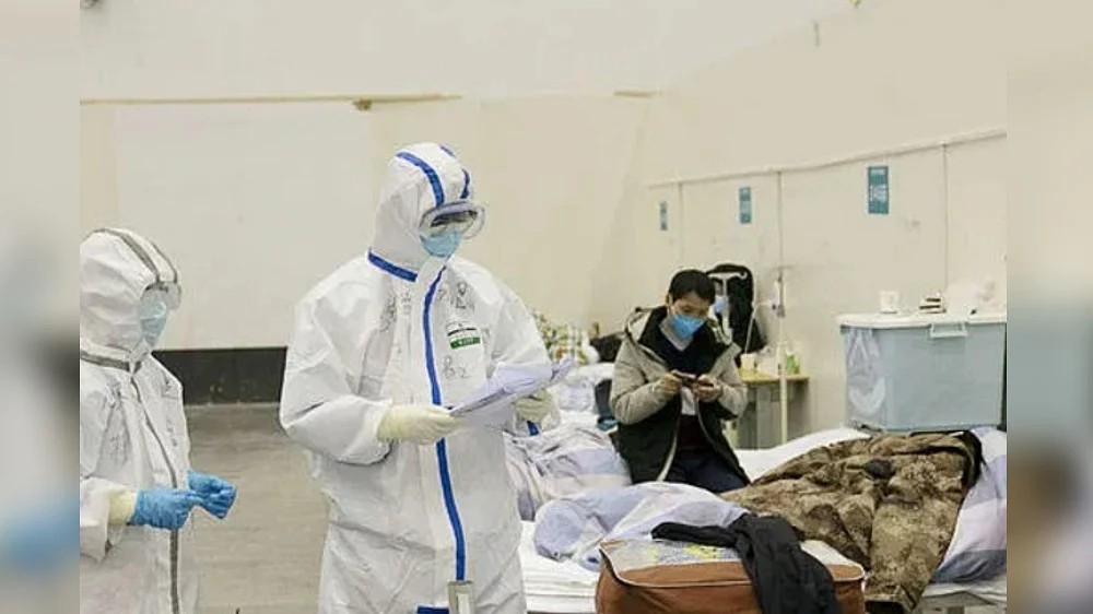 Chinese city plans 250,000 quarantine beds to fight virus