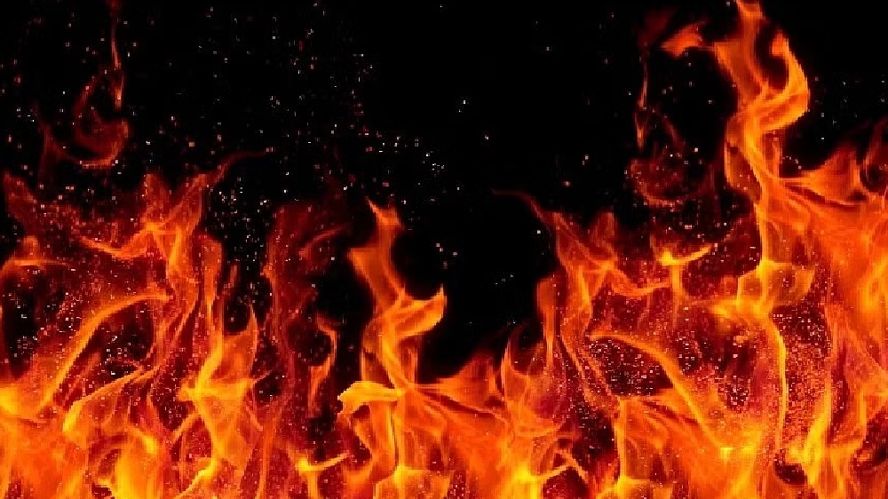 Lorry gutted after touching overhead cable