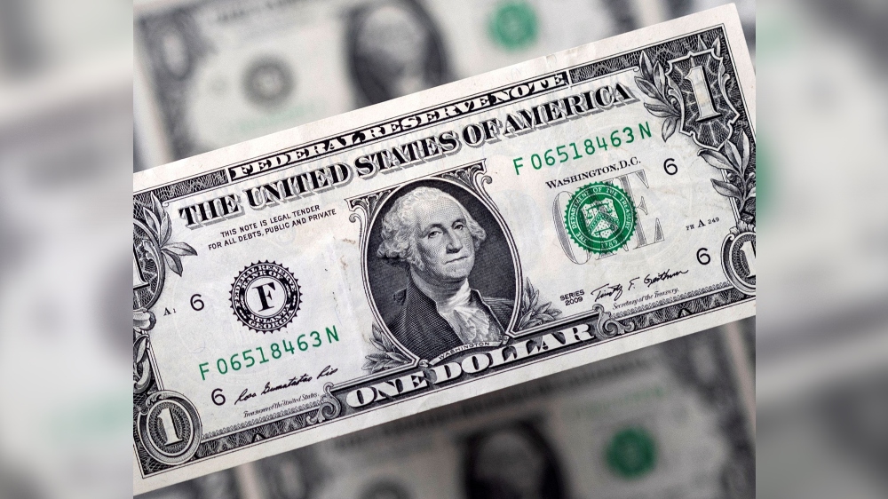 Dollar gains as traders gird for higher U.S. rates