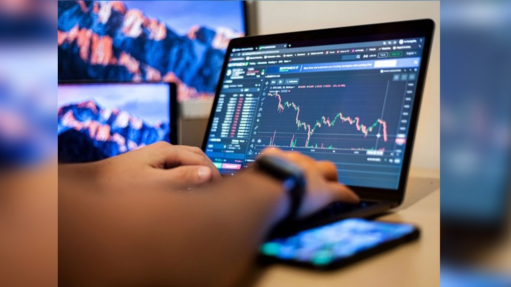 Markets open on a flat note as investors wait and watch