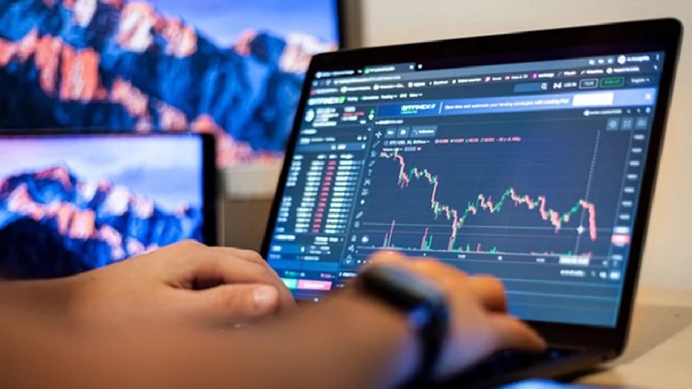 Asian markets follow Wall St up but headed for annual loss