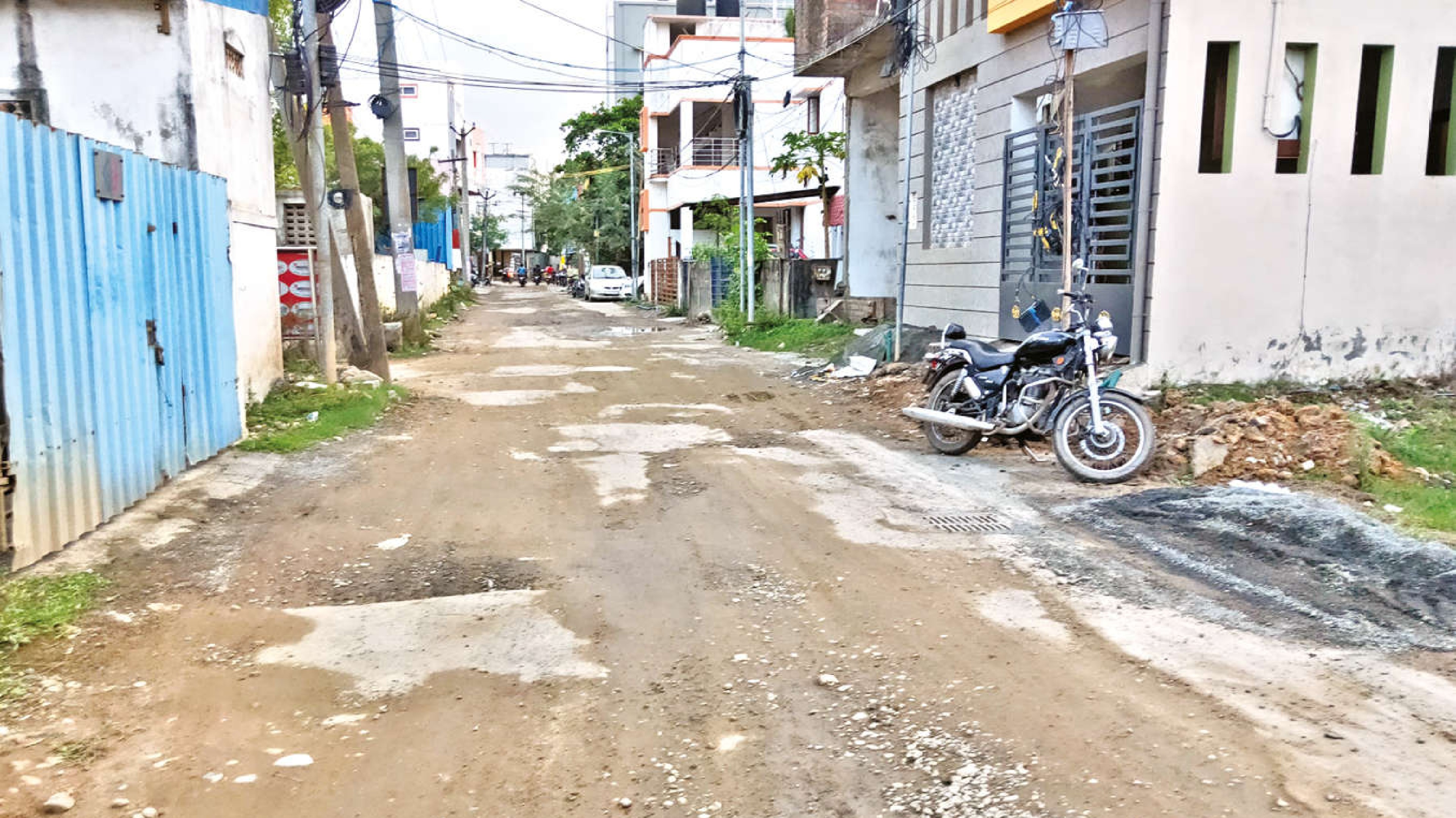 Pothole-ridden roads in Korattur North cause of concern for motorists Pothole-ridden roads in Korattur North cause of concern for motorists