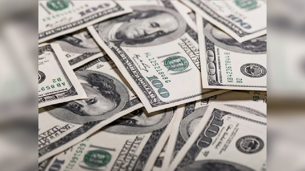 Dollar gains as Fed flags more rate hikes ahead