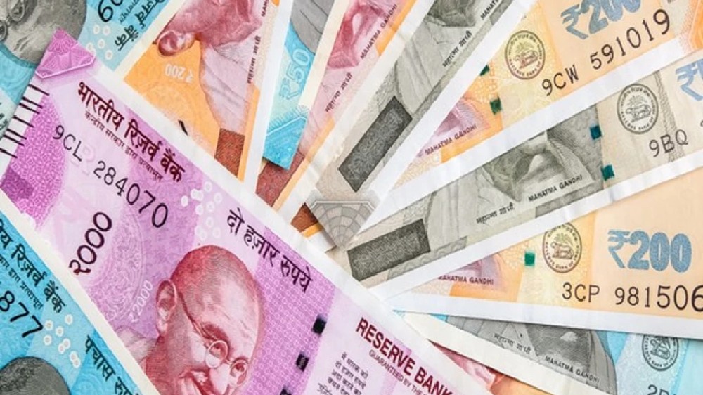 Rupee gains 9 paise to 82.69 against US dollar