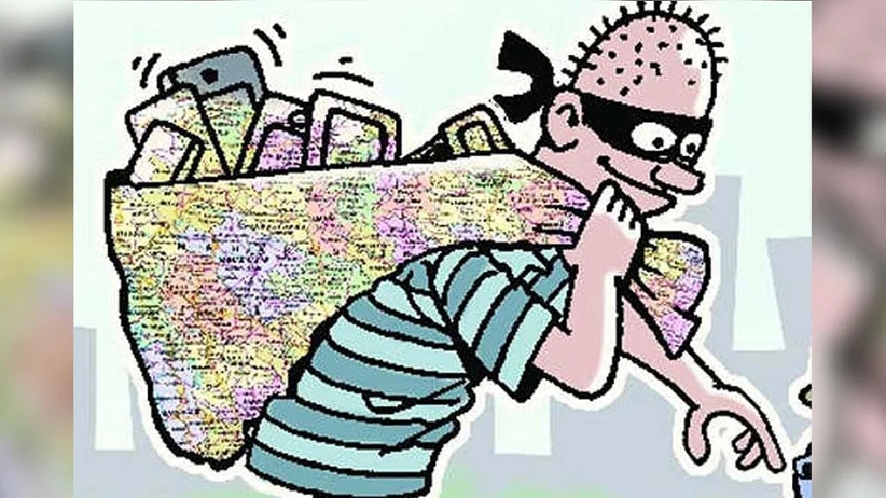 MacBook stolen from parked car near Vadapalani; one held MacBook stolen from parked car near Vadapalani; one held