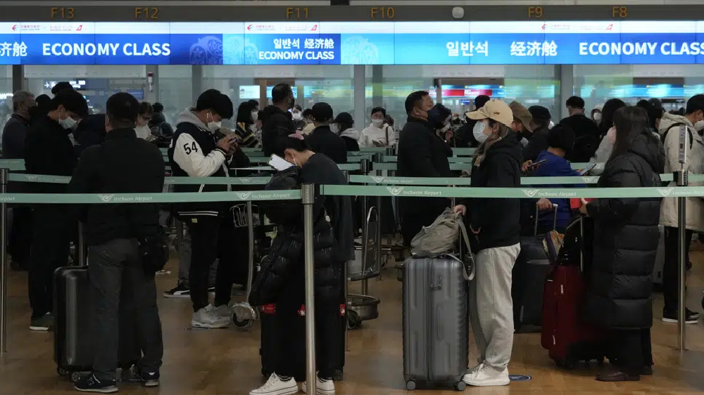 China halts visas for Japan, South Korea in Covid spat