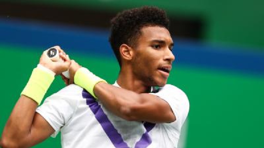 Aus Open: Felix finds a way from two sets down