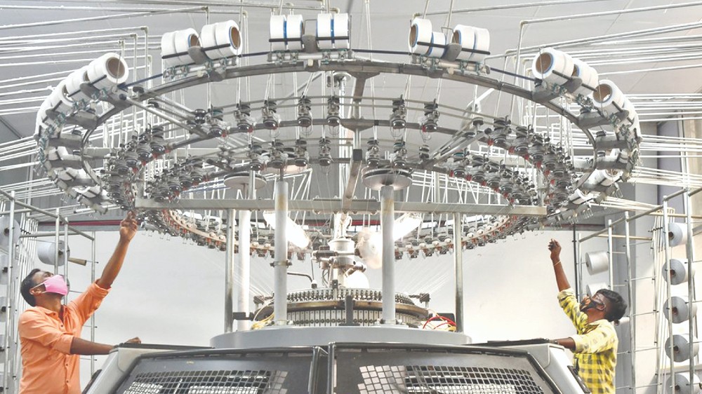 Robust demand drives manufacturing PMI to 13-month high in Dec