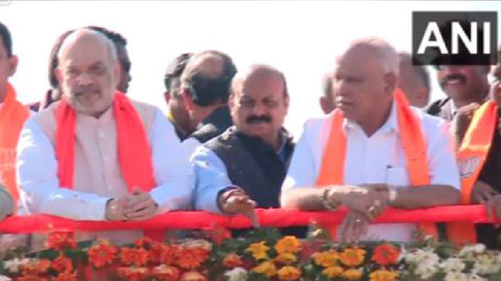 Amit Shah holds roadshow with CM Bommai, Yediyurappa in Dharwad