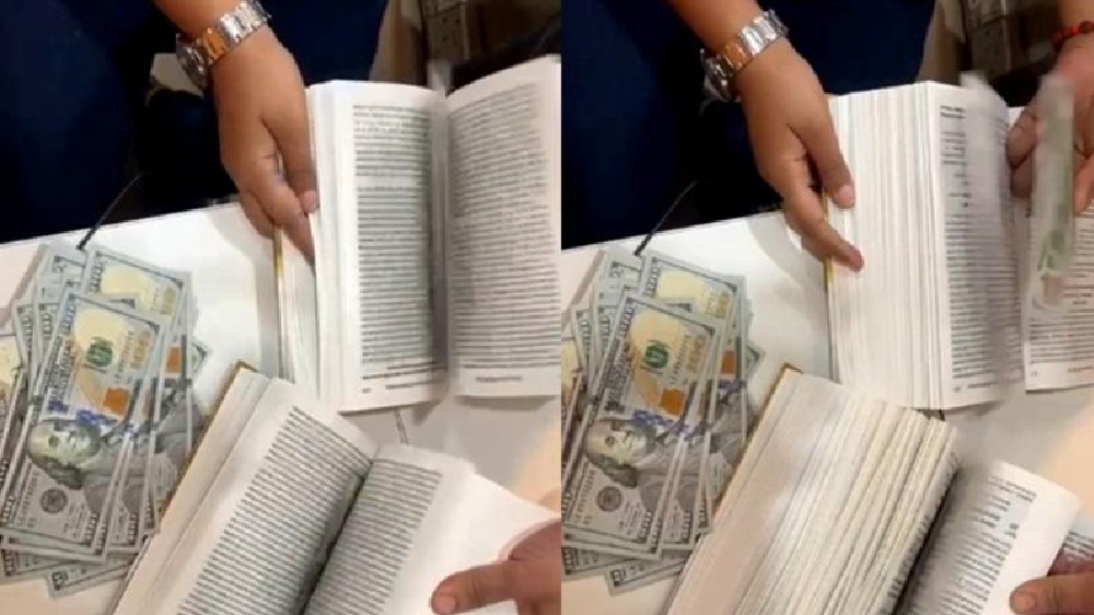 In video: Man hiding $90,000 between pages held at Mumbai airport
